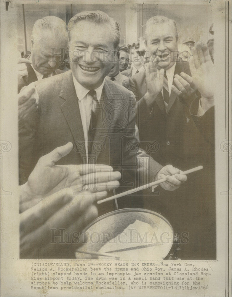 1968 Press Photo Nelson A Rockefeller Playing Drums And Gov Rhodes Looks On - Historic Images