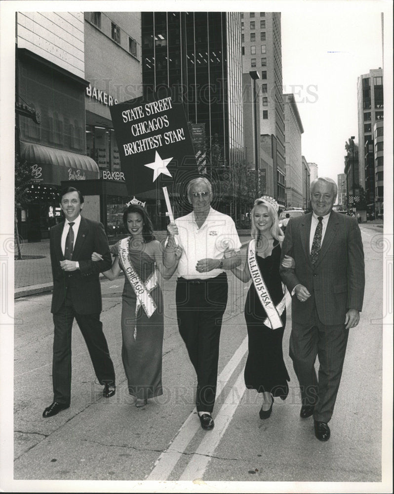 1954 Press Photo Ed McMahon marches on the street for the State Street Council - Historic Images