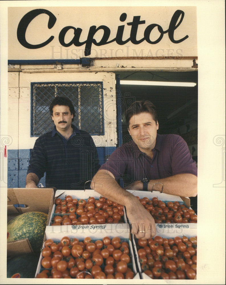 1989 Press Photo comedian Tom Bastounces and brother at their produce co. - Historic Images