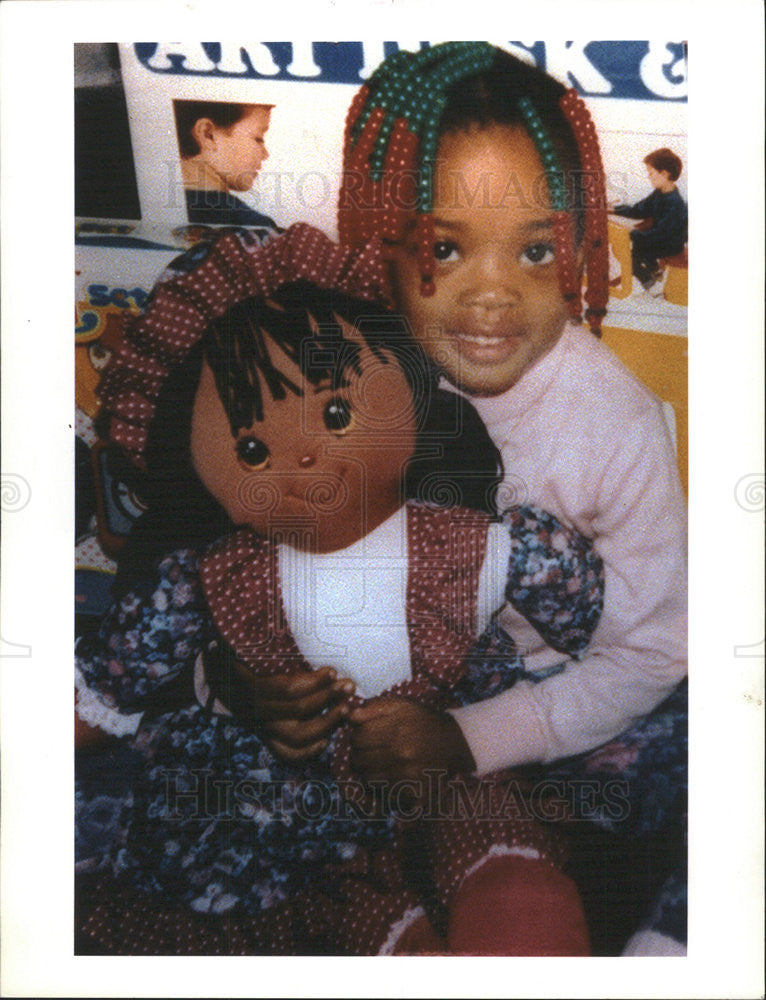 1997 Press Photo Cedra Perkins with Doll - Historic Images