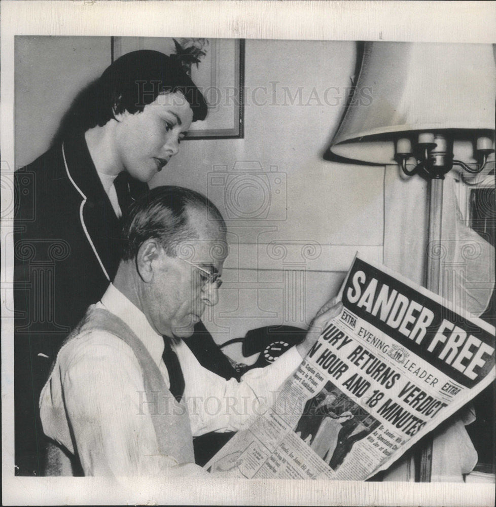 1950 Press Photo Reginald F. Borroto reads Dr.Hermann N. Sander - Historic Images