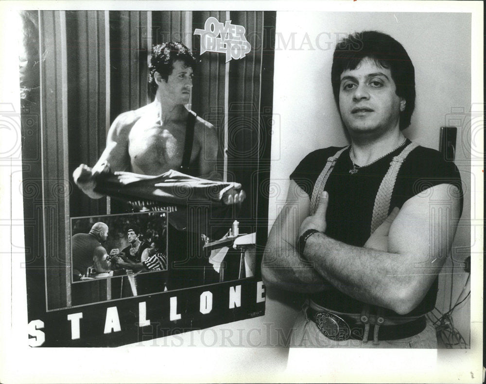 1987 Press Photo Actor Hopeful Paliferro Posing With Stallone Poster Chicago - Historic Images