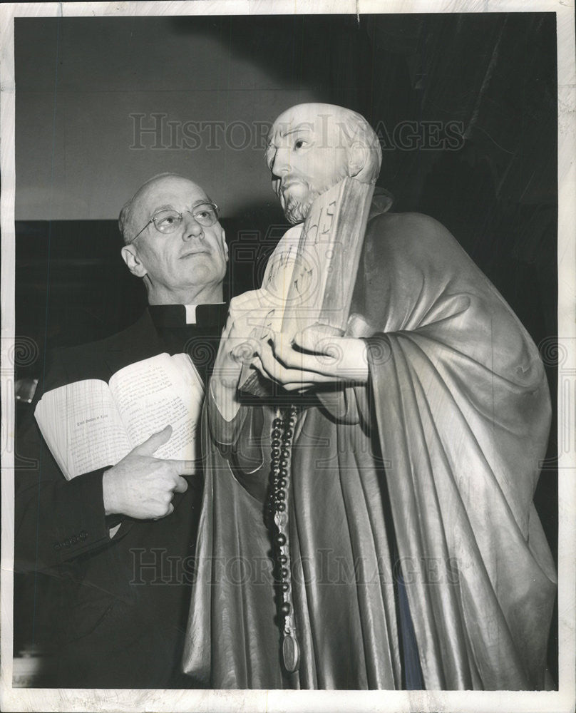 1956 Press Photo James F. Maguire Loyola University President admires statue - Historic Images