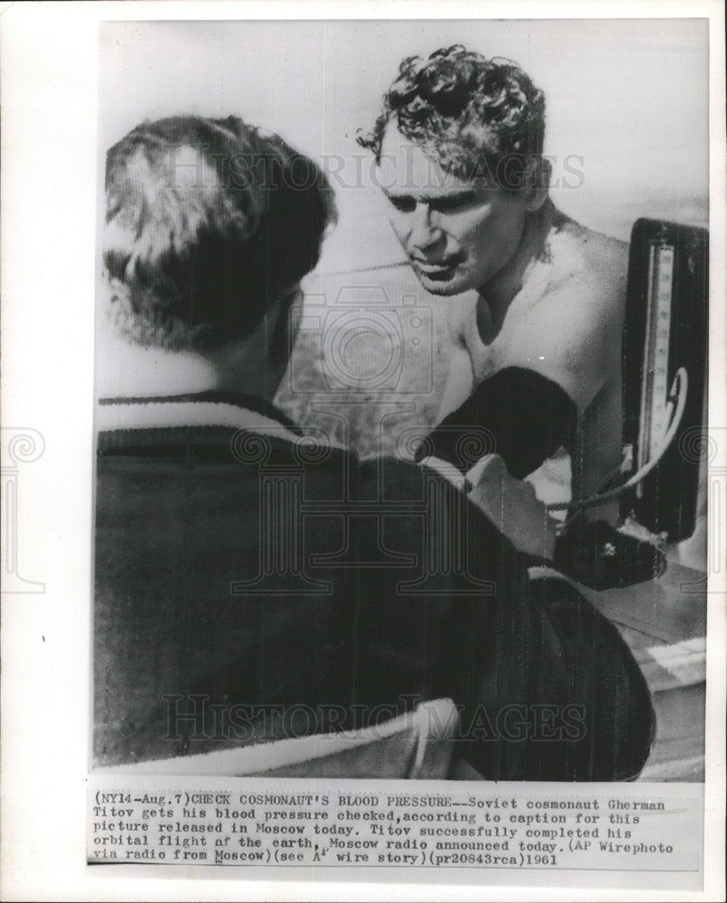 1961 Press Photo Soviet Cosmonaut Gherman Titov Gets His BP Checked. - Historic Images