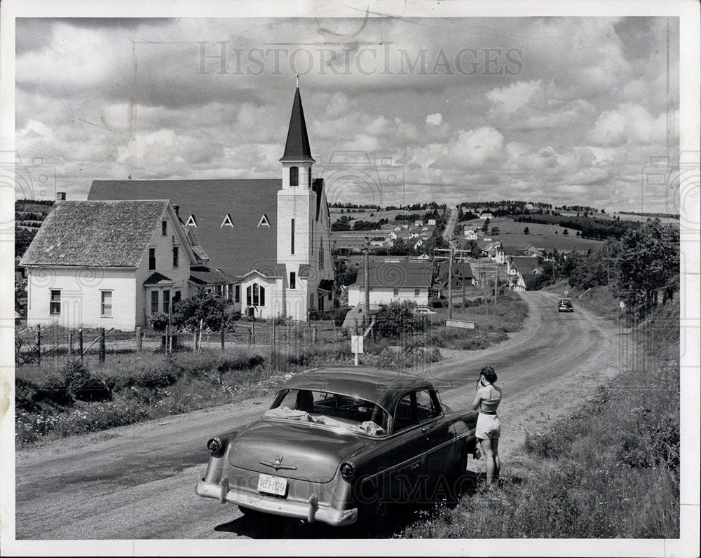 1960 Press Photo Woman Photographs Church in Hunter River, Prince Edward Island - Historic Images