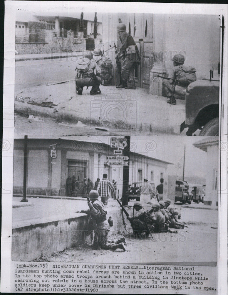 1960 Press Photo Nicaraguan National Guardsmen behind bldg in Jinotepe - Historic Images