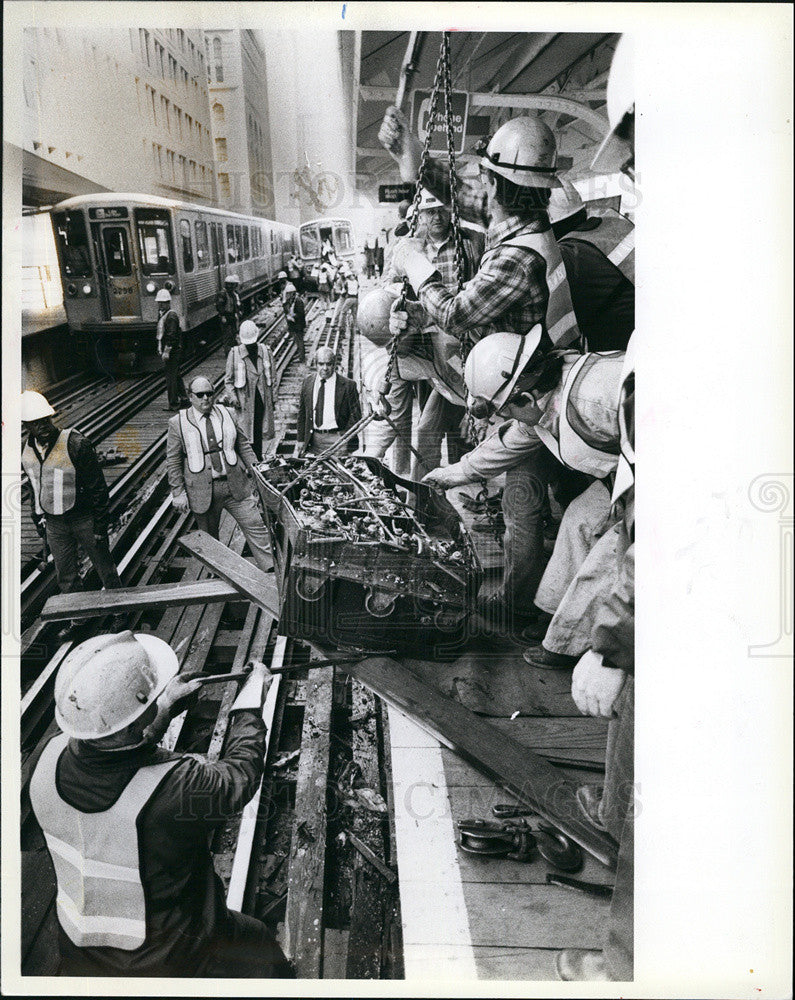 1983 Press Photo Battery Compartment from Tracks. Wreck in Background - Historic Images