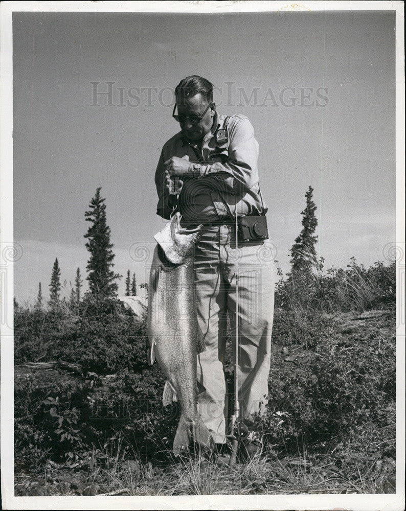 1964 Press Photo 25 Pound Trout Caught near Snowdrift Village Canada - Historic Images