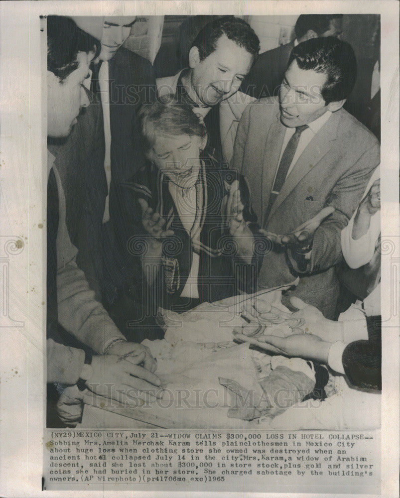 1965 Press Photo Mrs A Merchak Karam,Mexican,store was destroyed by bldgcollapse - Historic Images