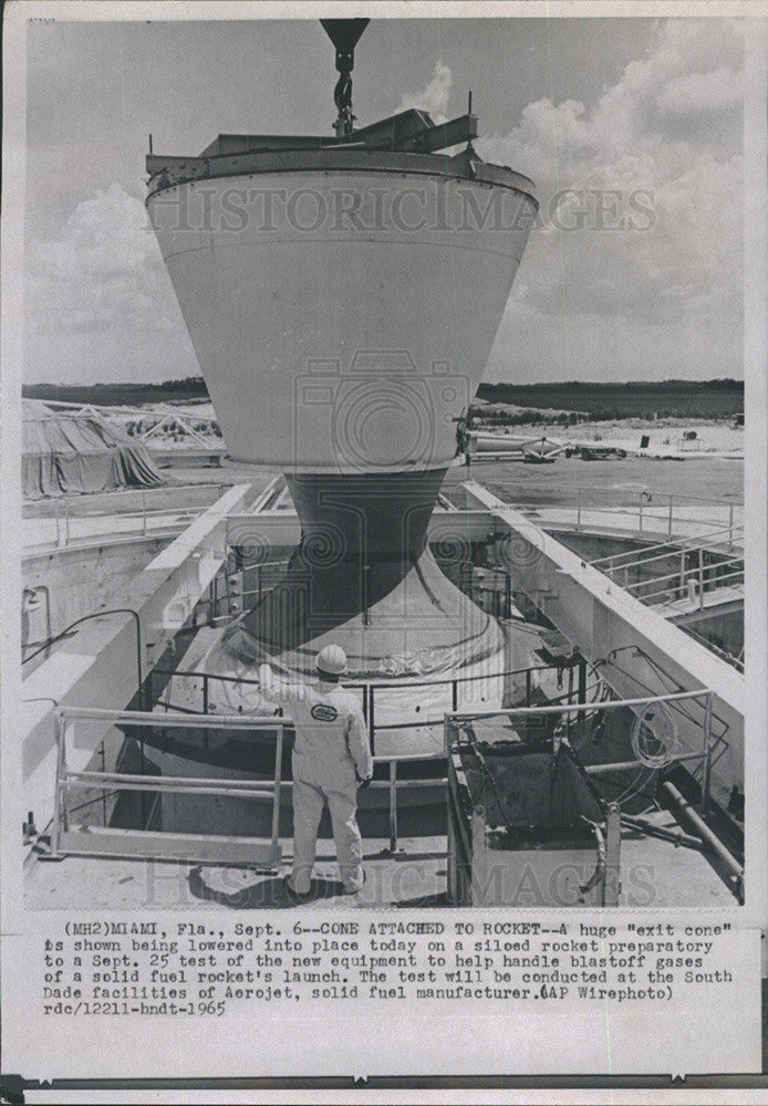 1965 Press Photo Exit cone being attached to a Rocket for a test in Miami Fl - Historic Images