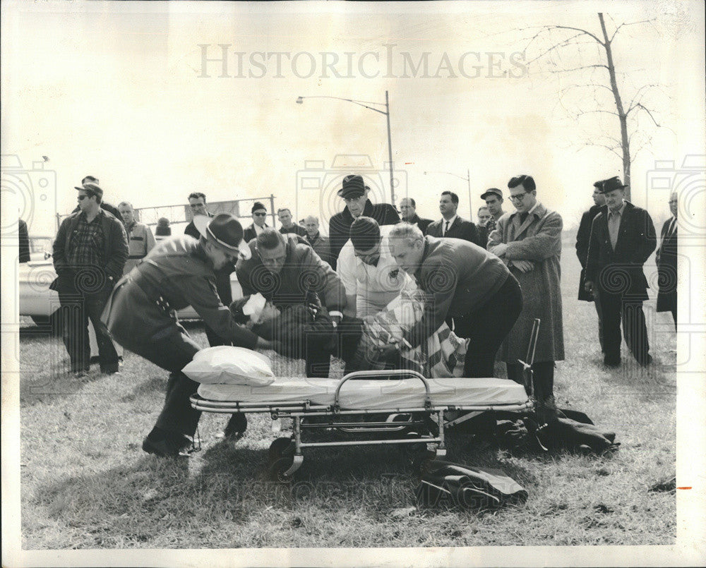 1964 Press Photo Injured Woman Placed on Stretcher after Accident - Historic Images