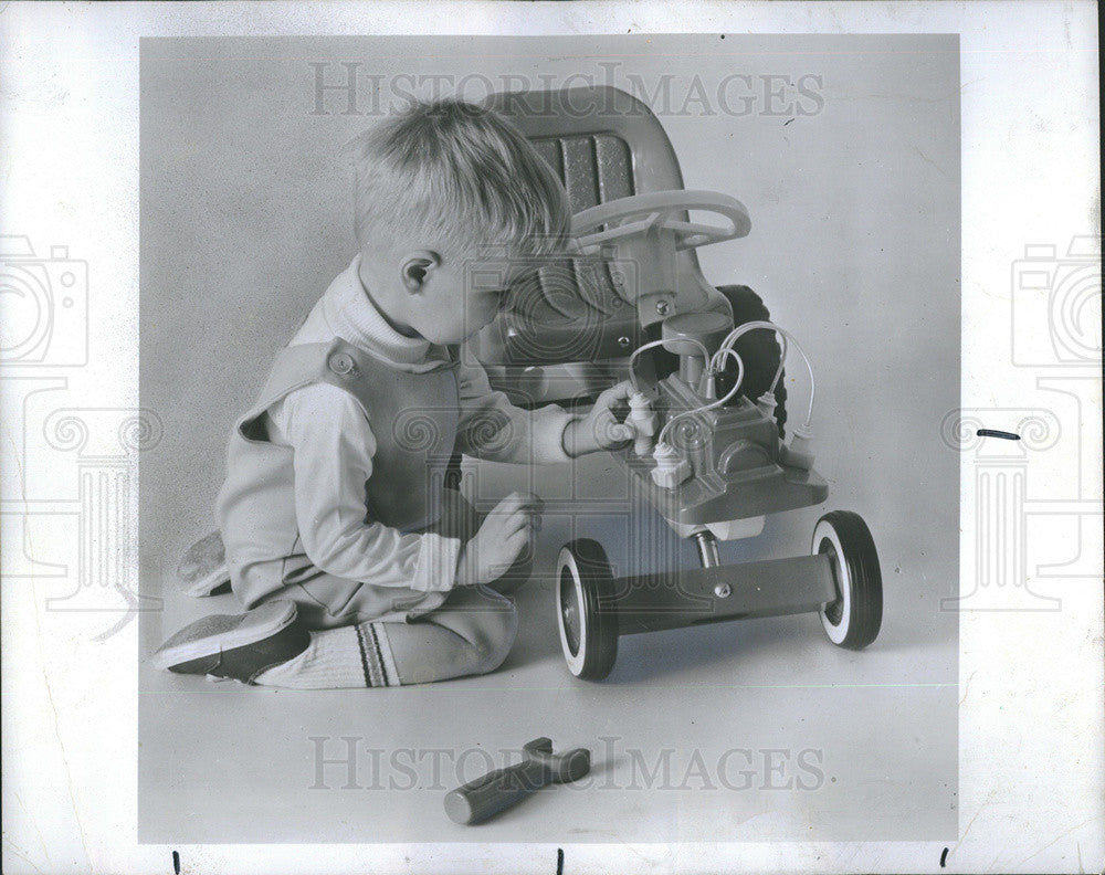 1970 Press Photo Toy car with a take apart motor for kids to learn on - Historic Images