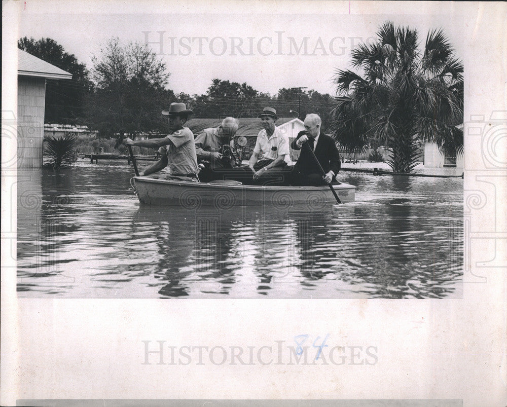 1964 Press Photo Hurricane Dora Governor Bryant Paddling Boat to Assess Damage - Historic Images