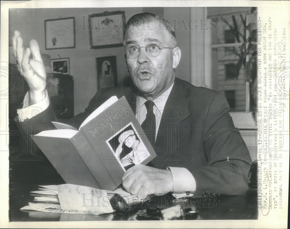 1944 Press Photo Rep. A.L. Miller reads a book about Gen. Douglas Macarthur - Historic Images