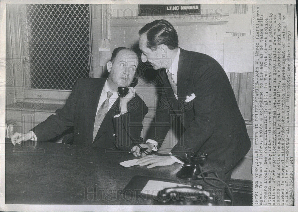 1947 Press Photo of John Meyer, Press Agent holds the telephone. - Historic Images