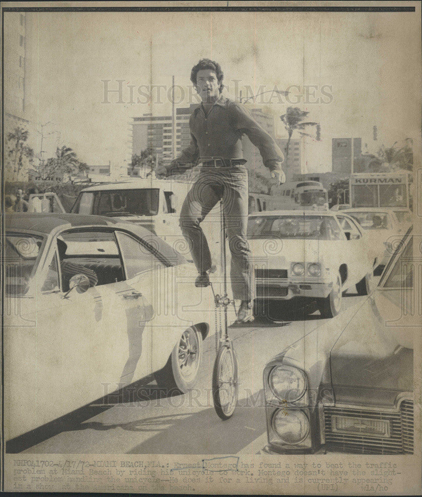 1972 Press Photo Ernest Montago Rides Unicycle Down Miami Beach Florida Street - Historic Images