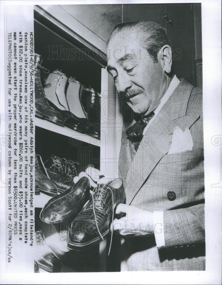 1956 Press Photo Actor Adolph Menjou Shows Off His Expensive Wardrobe - Historic Images