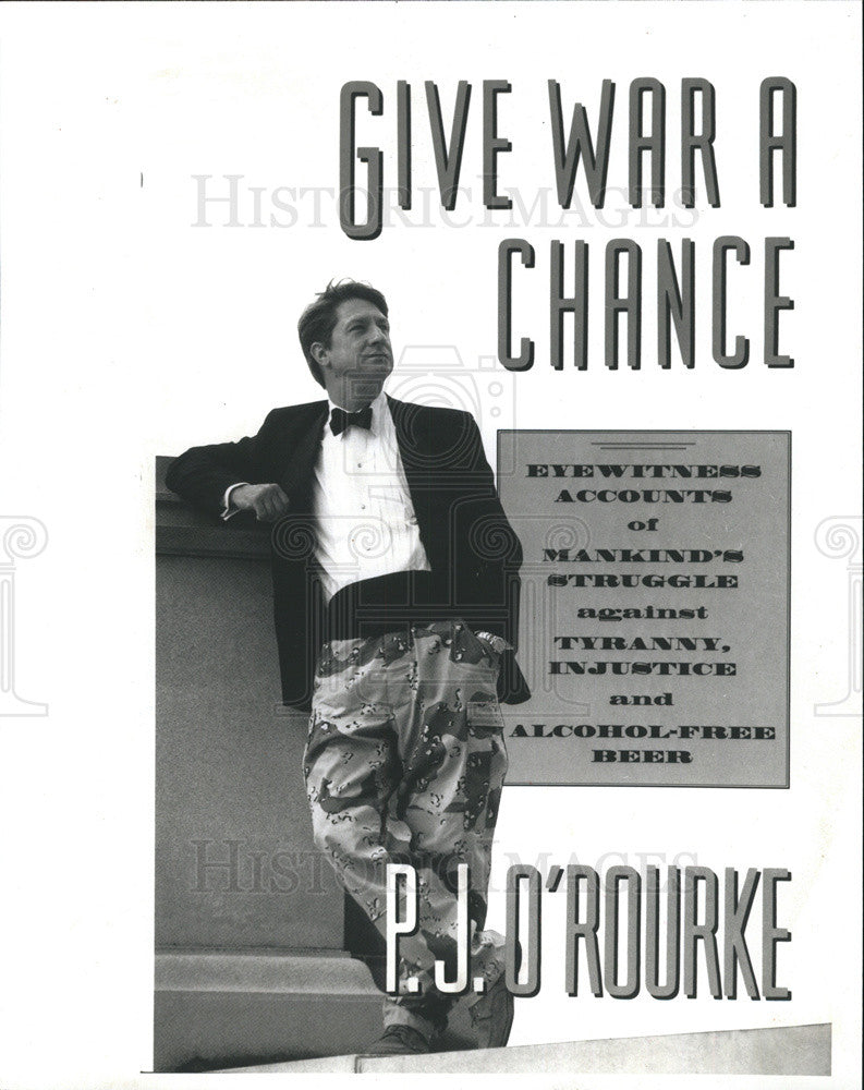 1992 Press Photo P.J. Rourke&#39;s Give War a Chance - Historic Images