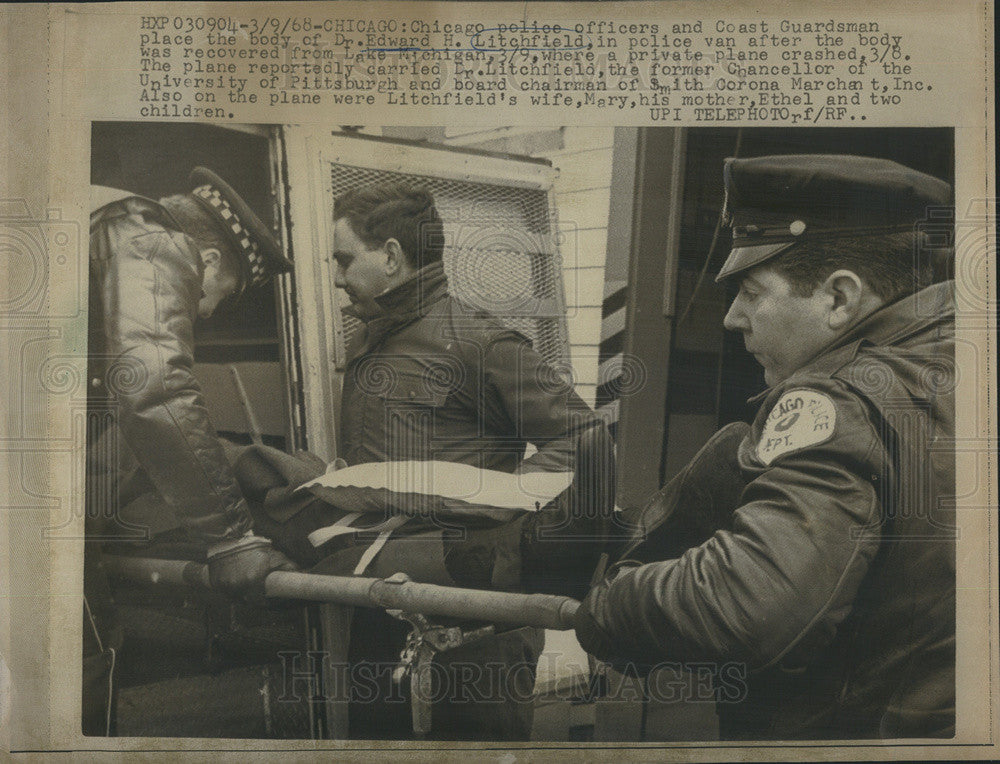 1968 Press Photo Body of Dr. Edward H. Litchfield being placed in police van. - Historic Images