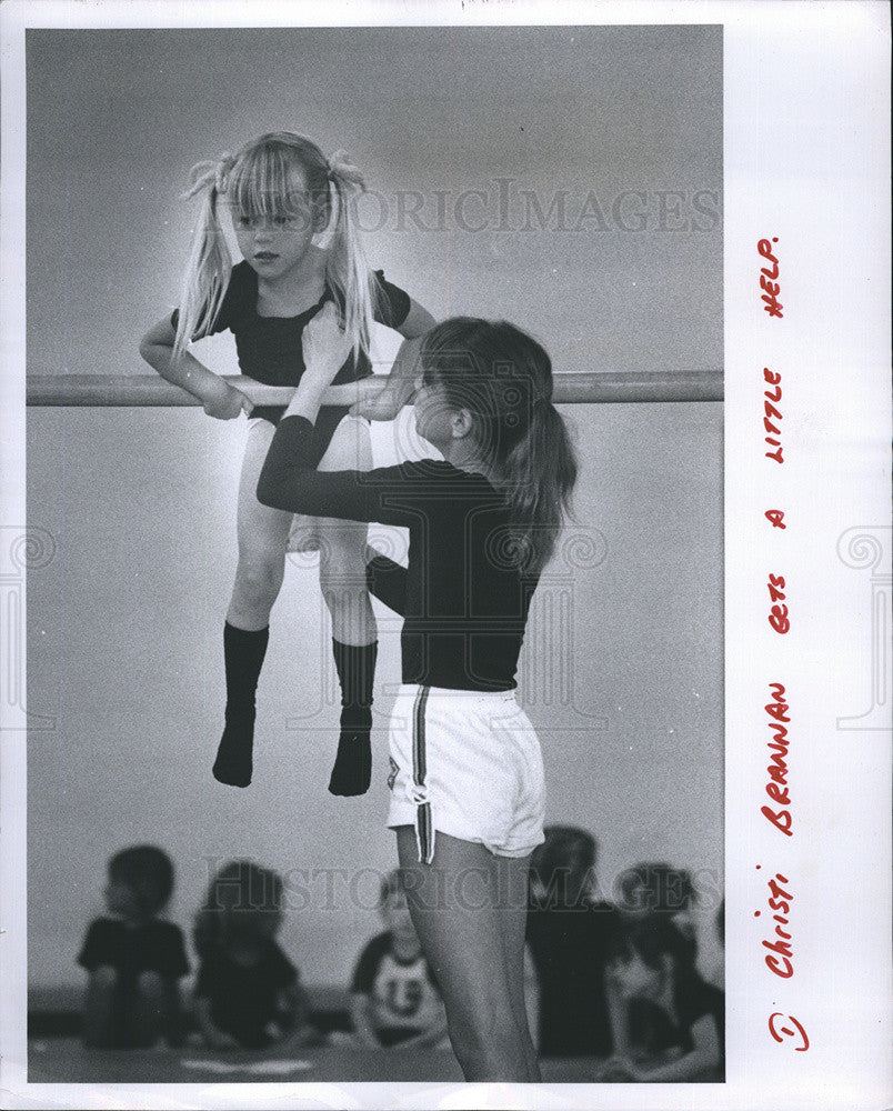 1980 Press Photo Christi Brannan gets a little help on gymnastics - Historic Images