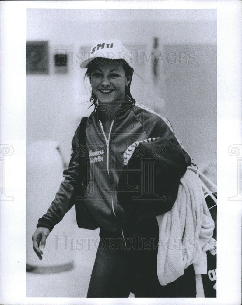 Press Photo of a Lady Athlete wearing a Southern Methodist University cap - Historic Images