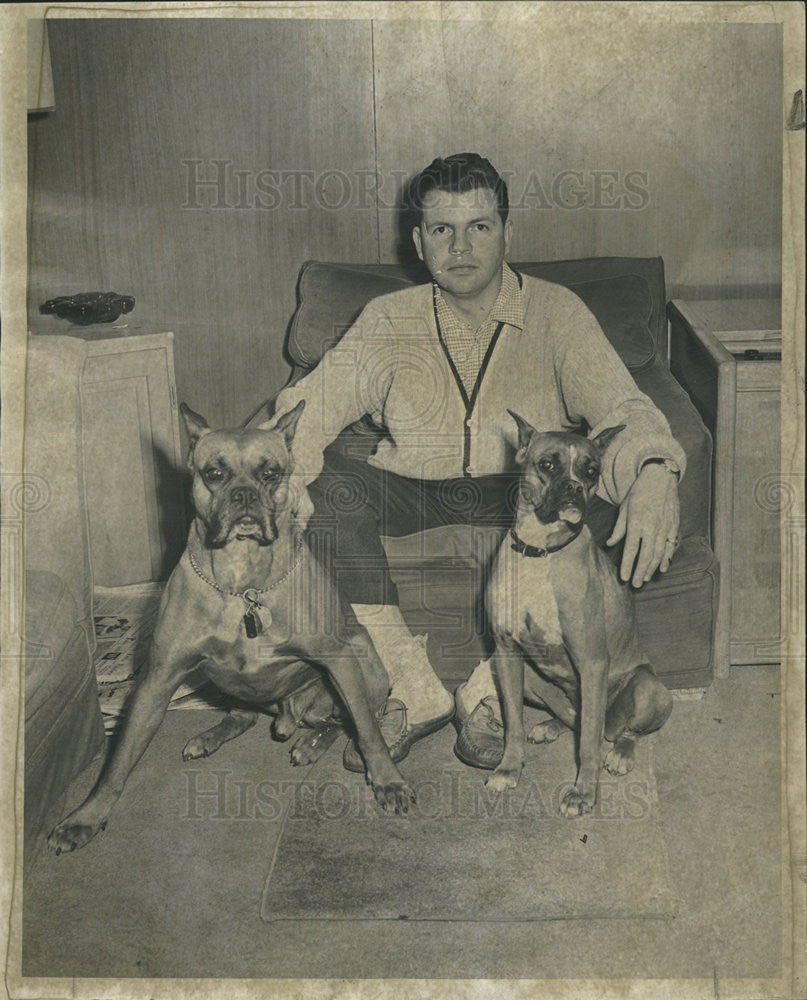 1957 Press Photo Timothy Canty Jr. boxer pets helped trap deputy assessors bribe - Historic Images