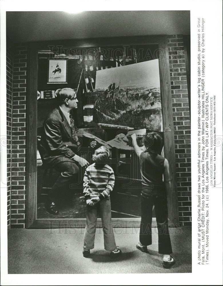 Undated Press Photo Photo Mural of artist Charlie Russell draws two Youthful Admirers - Historic Images