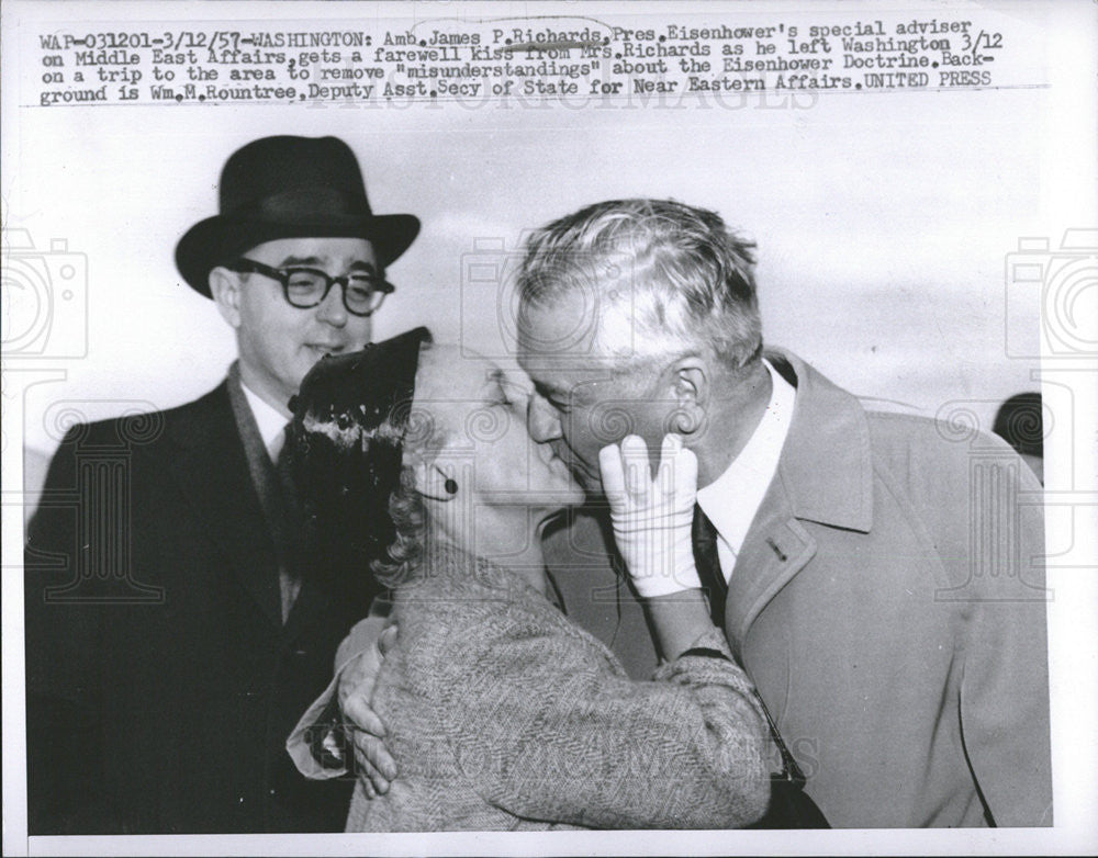 1957 Press Photo Amb James RIchards being Kissed by Mrs Richards - Historic Images