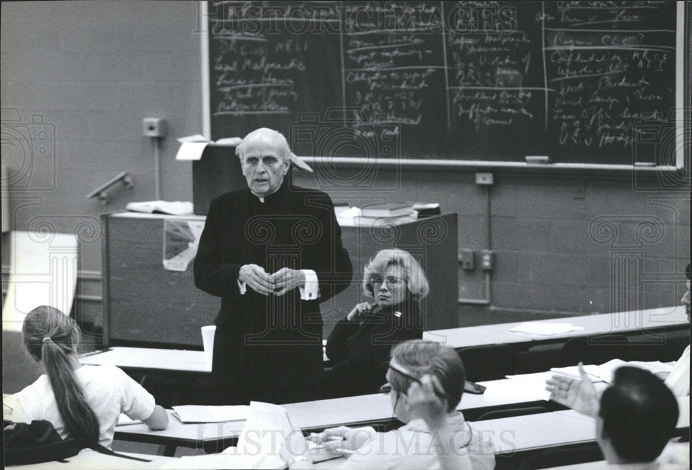 1990 Press Photo  Robert F. Drinan a Jesuit Priest who is a law professor. - Historic Images