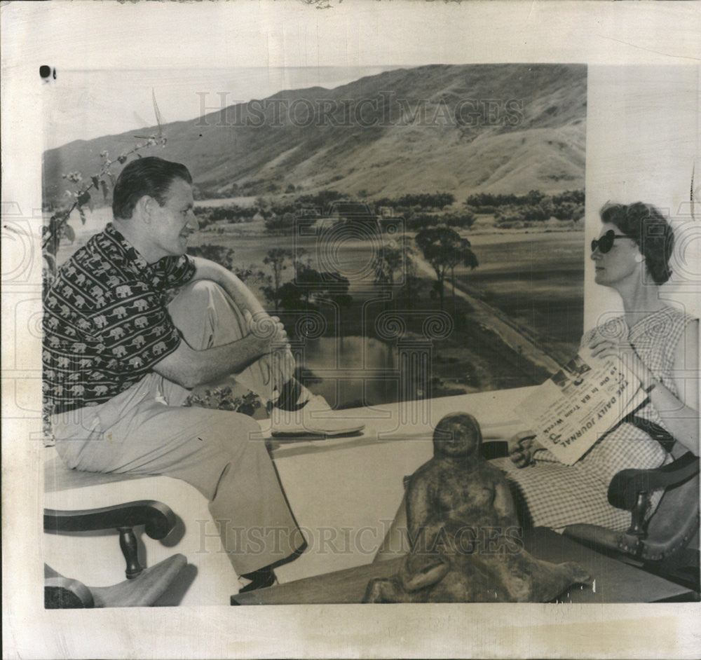 1958 Press Photo Gov. Elect Nelson Rockefeller and wife relaxing on a porch - Historic Images