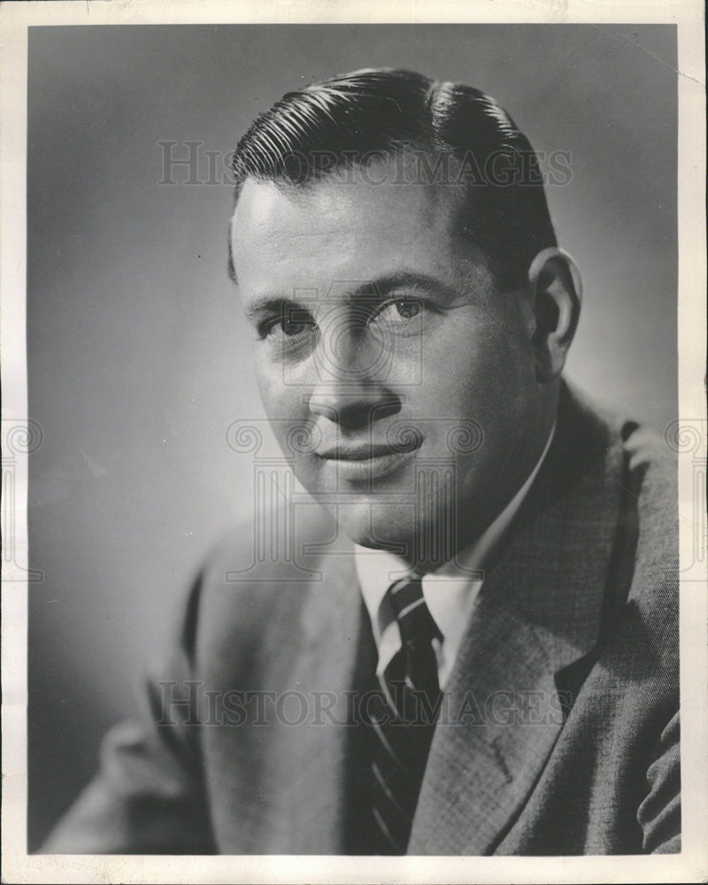 Press Photo Richard Revnes, Chicago Association of Commerce. - Historic Images