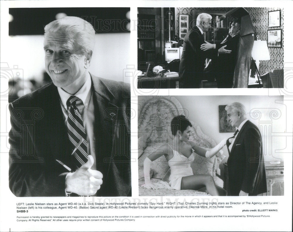 1996 Press Photo Leslie Nielsen Star Agent WD-40 Spy Hard Charles Durning - Historic Images