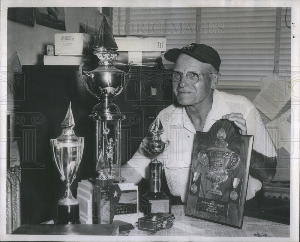 1957 Press Photo Marty Nilsen&#39;s trophies for Daily News Regatta - Historic Images