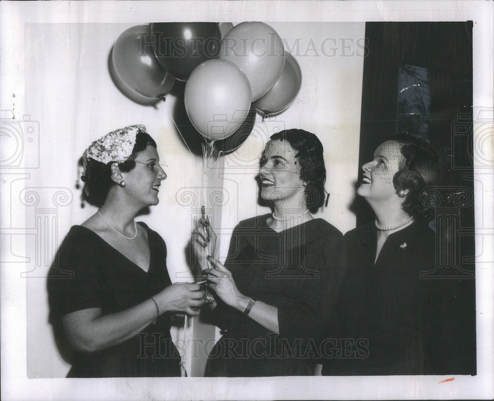 1956 Press Photo Decorations for the Circus Ball are admired by Louise Lyman, - Historic Images