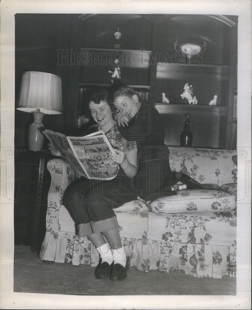 1951 Press Photo Emily relaxes at home - Historic Images