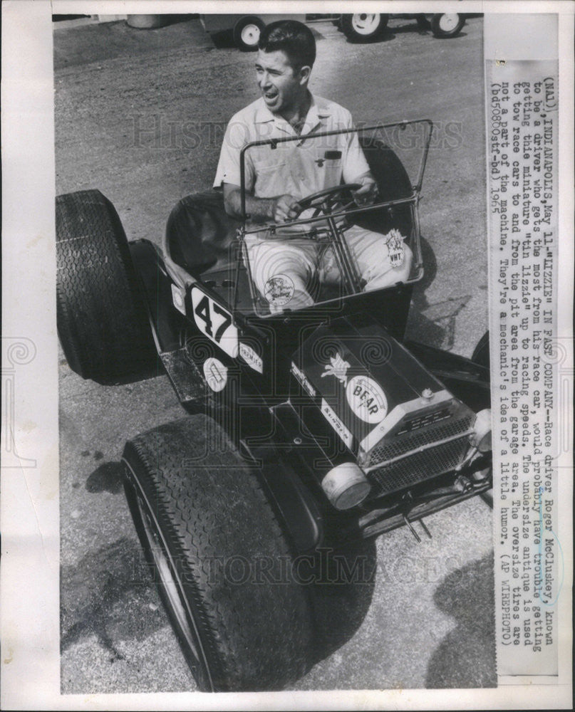 1965 Press Photo Roger McCluskey Race Driver Miniature Tin Lizzie Antique Car - Historic Images