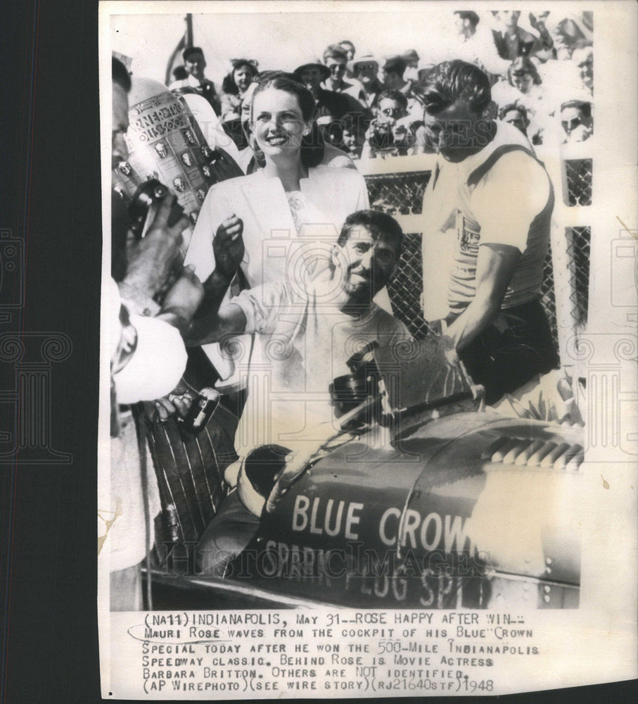 1948 Press Photo Mauri Rose Waves From the Cockpit of His Blue Crown - Historic Images