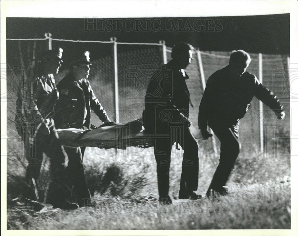 1986 Press Photo Body of a Suspect Involved in Car Chase &amp; Shootout - Historic Images