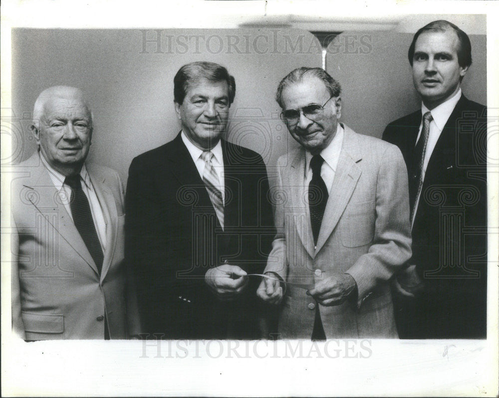 1987 Press Photo Seymour Shub delivers a check for $39,000 to Pay Bosco - Historic Images