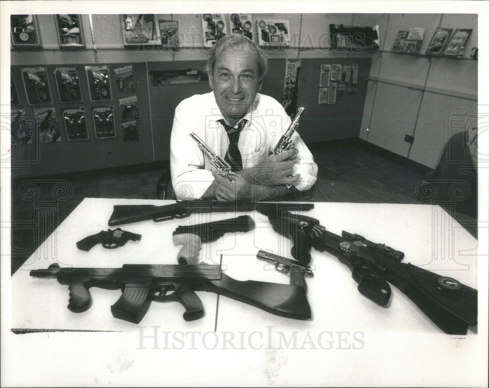 1988 Press Photo Richard Shure Chairman Strombecker Corp. Toy Guns ...