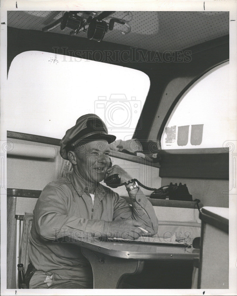 1964 Press Photo Bob Lawrence Charter Boat Captain Using Telephone On His Boat - Historic Images