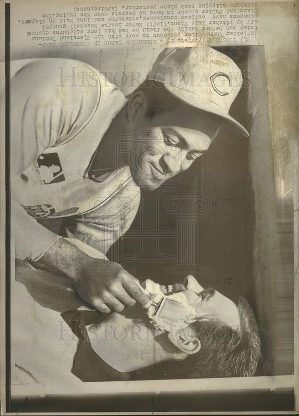 1969 Press Photo of Luis Tiant shaving Vern Fuller of Cleveland Indian