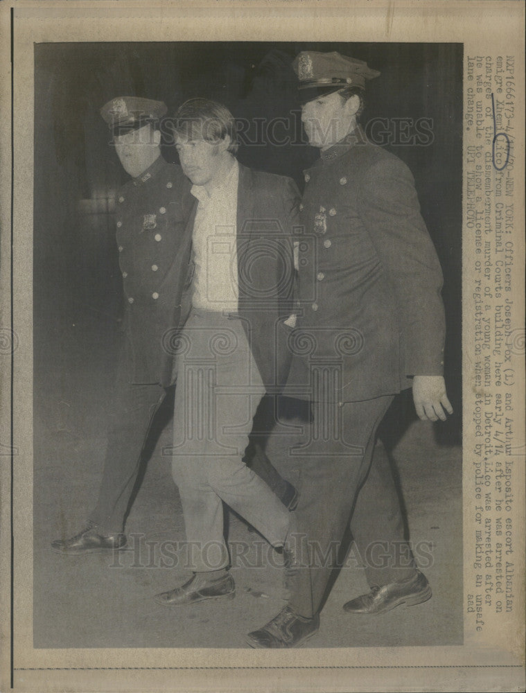 1970 Press Photo Xhemi Chico Being Escorted after Arrest on Dismemberment Charge - Historic Images