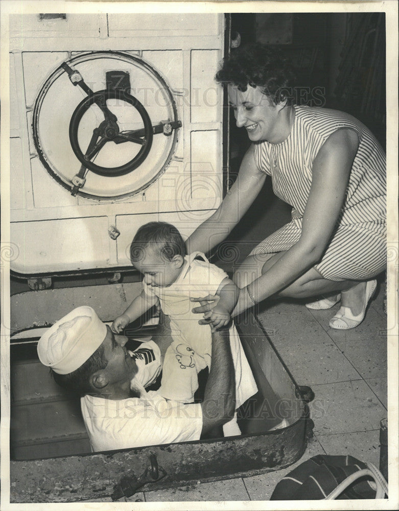 1963 Press Photo USS Joy crewman E Porter greeted by wife and kids - Historic Images