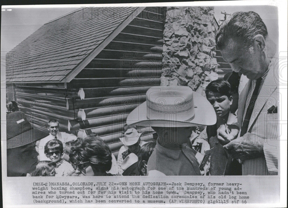 1966 Press Photo Jack Dempsey,former heavyweight champ signs autographs - Historic Images