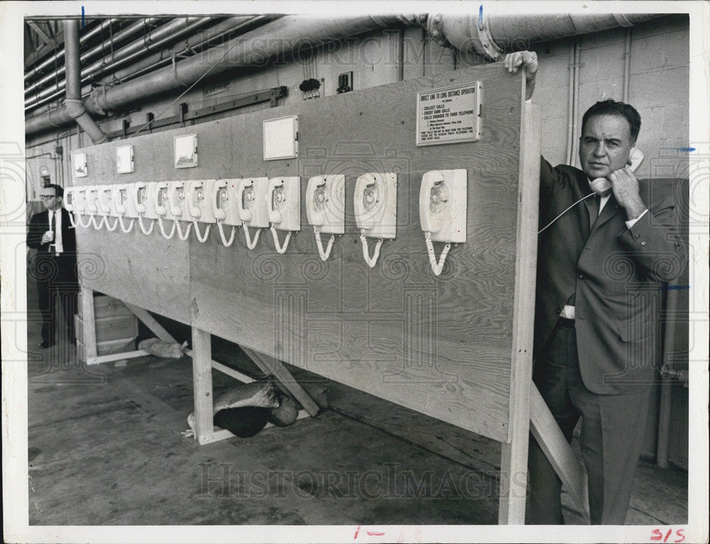 1964 Press Photo  A wall of telephones - Historic Images