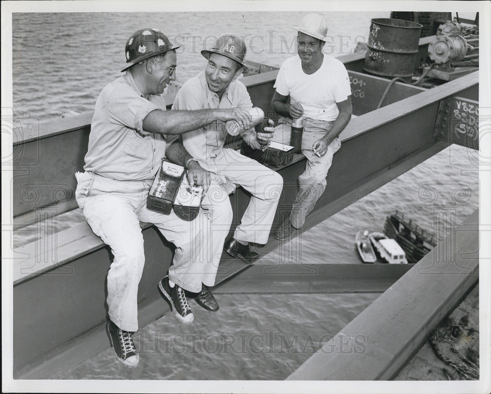 Press Photo sharing coffee on boat - Historic Images