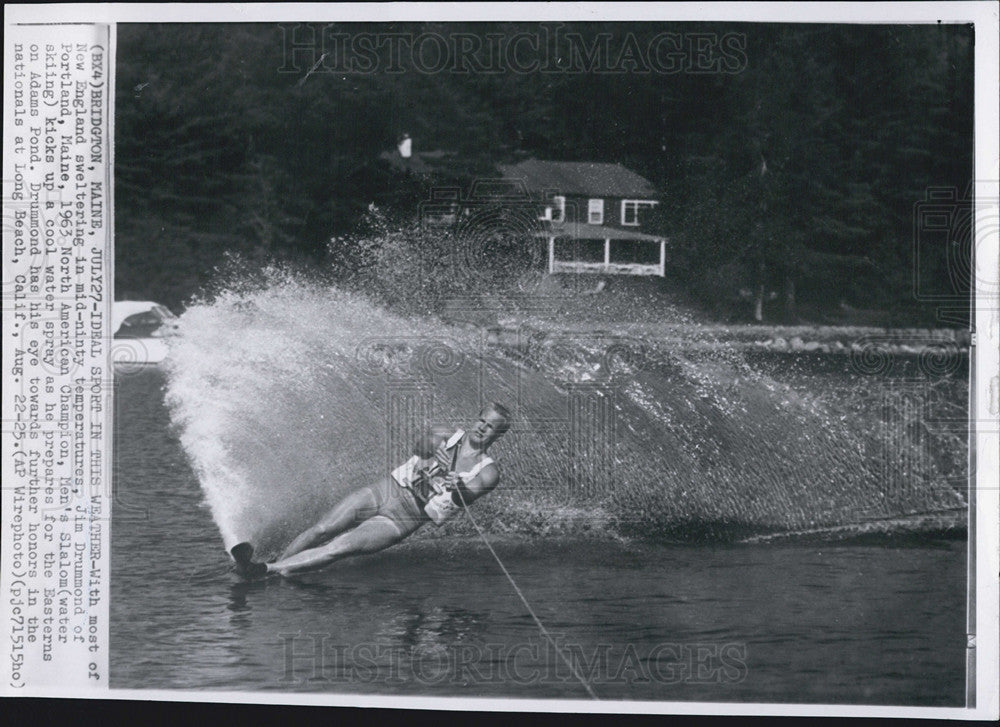 1963 Press Photo Jim Drummond kicks up a cook water spray - Historic Images