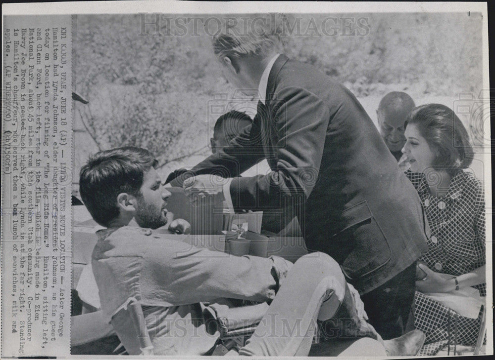 1966 Press Photo Actor George Hamilton With Guest Lynda Johnson Filming Location - Historic Images