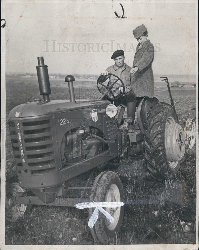 1949 Press Photo M. Jolivet and son with their new tractor at Le Petit Entrerin - Historic Images